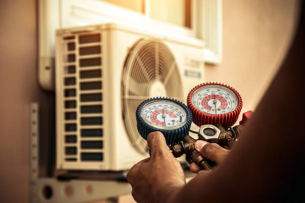 Professional Heat Pump Repair technician working in Hillsdale, NY